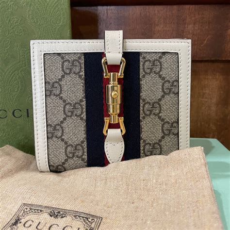 portafoglio compatto gucci|Gucci Bags for Women .